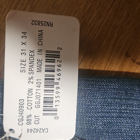 Classic Blue Boot Cut Jeans with Subtle Distressing - Picture 8 of 8